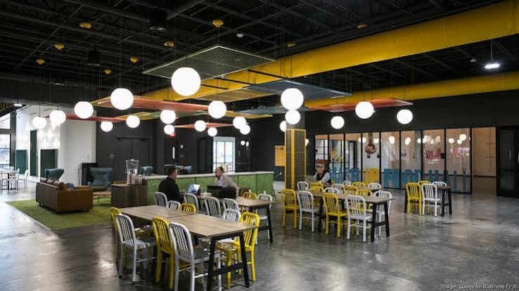 Mashup Food Hall seating with globe lights